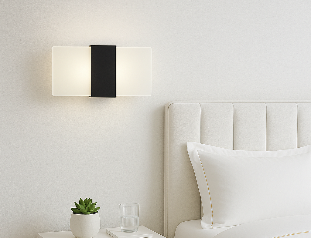 Modern bedroom with a nightstand, lamp, and bed.