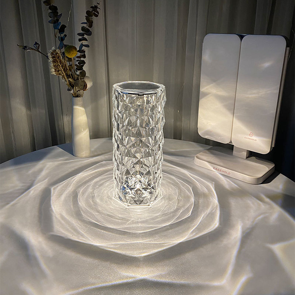 Crystal vase on a textured surface with a blurred background