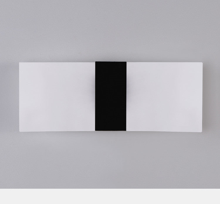 Wall light with a black strip on a gray background