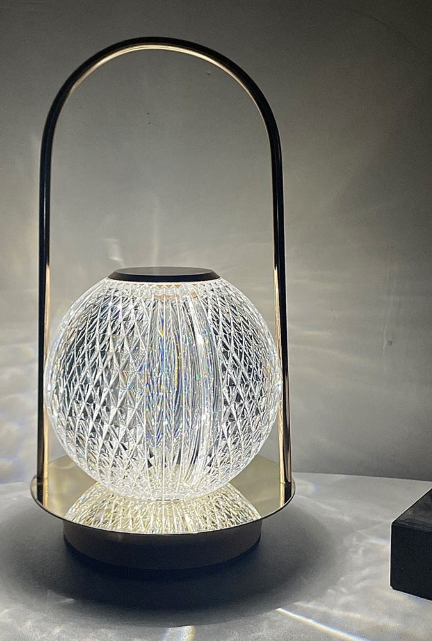 Modern table lamp with a unique design on a gray surface