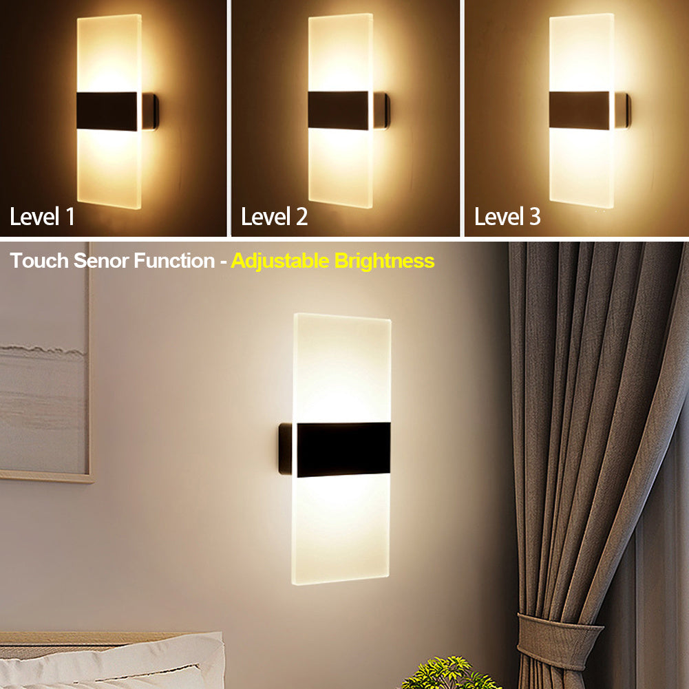 Wall-mounted light fixture with adjustable brightness levels shown in a room setting.